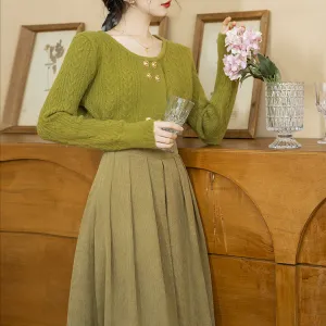 Yellow-green knitted sweater and corduroy skirt